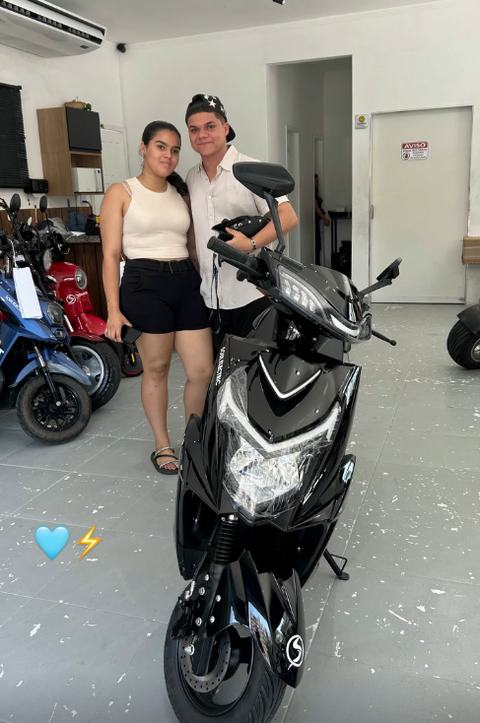 Cliente com veículo elétrico Soul